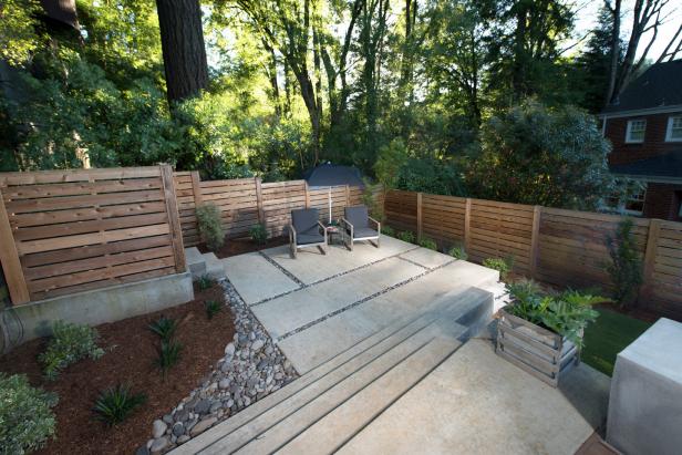 Backyard Sitting Area With Contemporary Landscaping And Modern Fence Hgtv