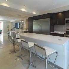 Contemporary Open Plan Kitchen With White Barstools