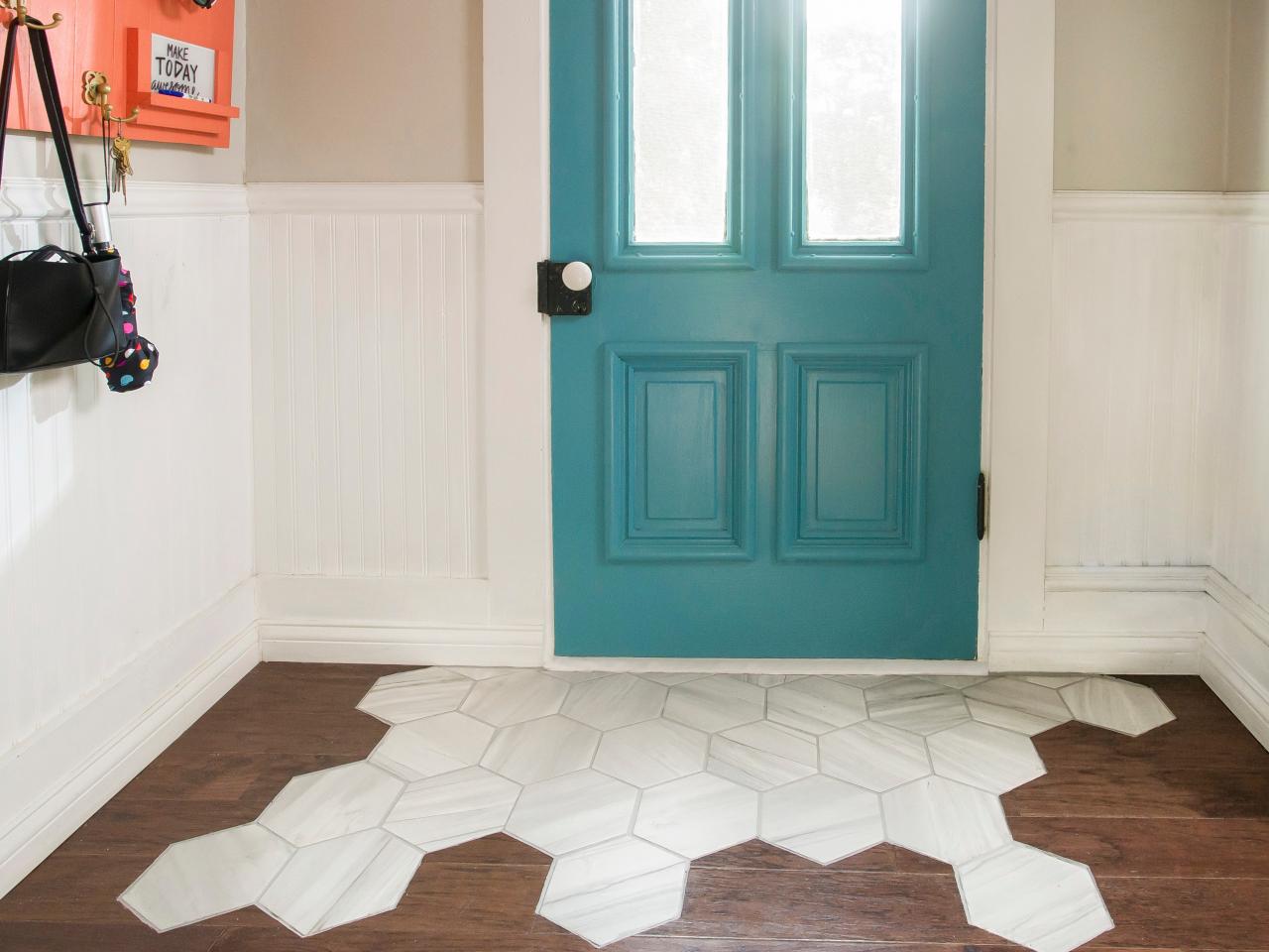A Tile Rug Within Hardwood Floor, Tile On Wood Floor