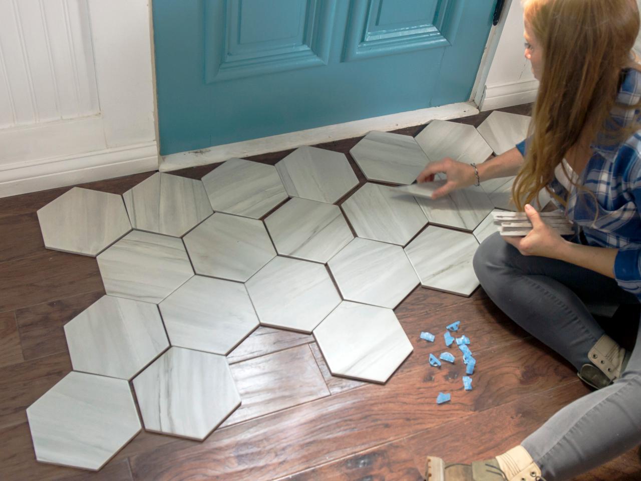 A Tile Rug Within Hardwood Floor, Tile Inlay In Wood Floor Kitchen