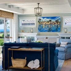 Blue Coastal Living Room With Painting