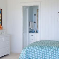 White Coastal Bedroom With Blue Bed