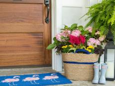 Has your plastic laundry basket seen better days? Give it new life as a summery, jute-wrapped flower container.