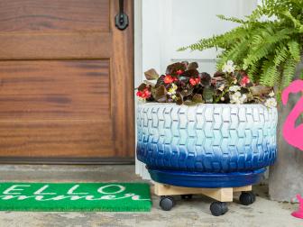 Don't toss those old tires! Turn them into chic planters with a little paint and some materials from the hardware store.