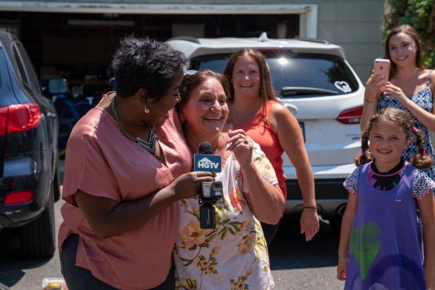 HGTV Host Tiffany Brooks surprises Josephine Montgomery of Farmingdale, New York, that she is the grand-prize winner of the HGTV Smart Home 2018 located in Buffton, SC.