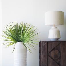 Greenery Brings Life, Color to Neutral Living Room