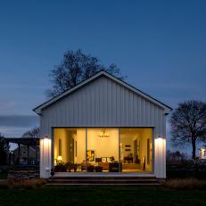 Exterior Lights Help Showcase Farmhouse Additions at Night