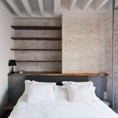 Master Bedroom With Exposed Brick Wall
