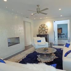 White Living Room With Blue Rug