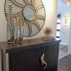Entryway Features Alligator Cabinet, Gold Artwork
