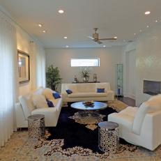 Transitional White Living Room With Blue Rug