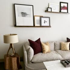 Modern Rustic Apartment Living Room With Gray Sofa And Wood And Gold Accents