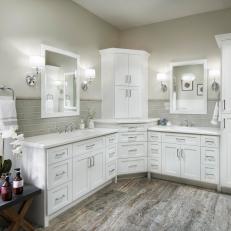 Contemporary White Master Bathroom With Double Vanities And Gray Glass Subway Tile Backsplash