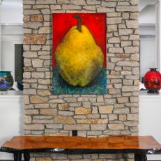 Stone Fireplace Detail With Modern Art And Console Table