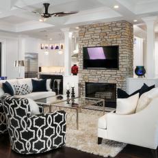 Contemporary Living Room With Black And White Upholstered Furnishings And Fireplace