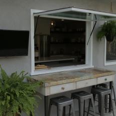 Gray Rustic Outdoor Bar with Neutral Marble Countertop 