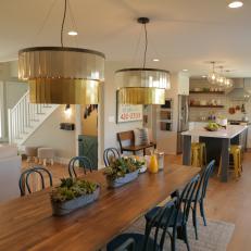 Rustic Neutral Dining Room with Metallic Gold Light Fixtures 