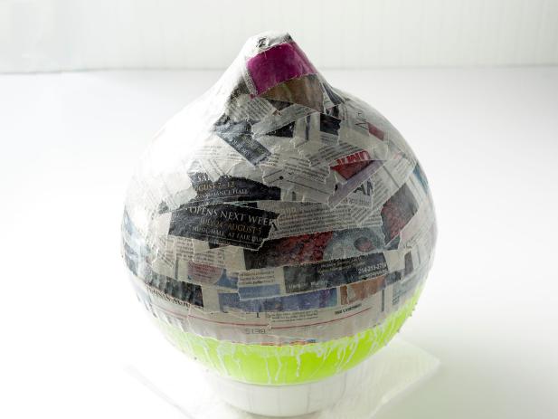 Learn how to make a paper mache light pendant.