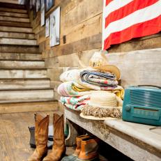 Rustic Entryway Features Bench and American Flag