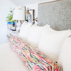 Multicolored Bolster Pillow Adds Color and Pattern to Bed