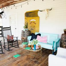 Rustic Porch Has Intimate Sitting Area