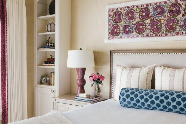 Traditional Bedroom With Upholstered Headboard And Purple Accents