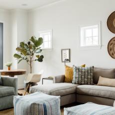 Contemporary Neutral Living Room With Upholstered Sectional And Ottomans