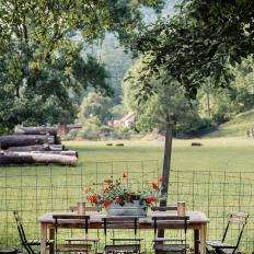 Wood Dining Set With View of Pastures