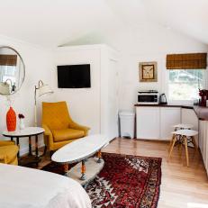 Eclectic Guest House With Vaulted Ceilings