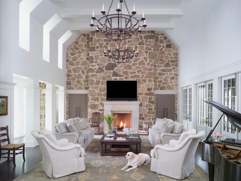 Country Family Room With White Walls And Stone Accent Wall