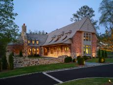 Craftsman Farmhouse Exterior In Stone And Brick With Wood Details