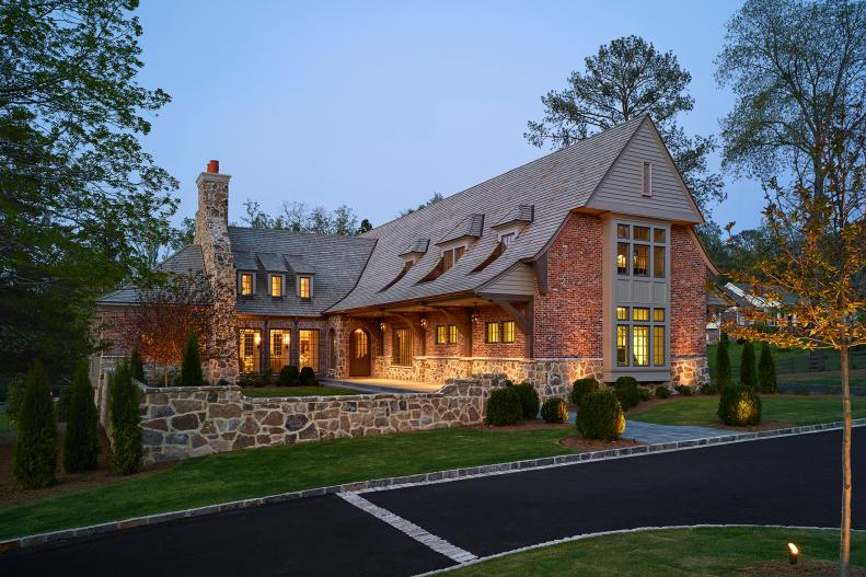 Craftsman Farmhouse Exterior In Stone And Brick With Wood Details