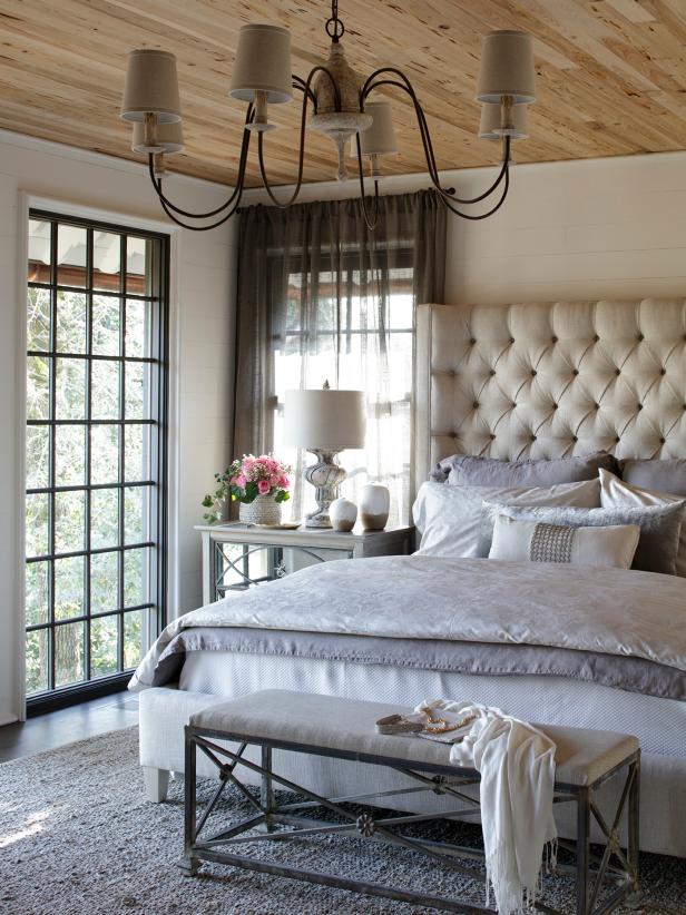 French Country Main Suite With Tufted Headboard