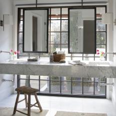 Iron Mirrors Suspended Over Floating Vanity