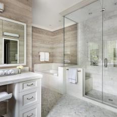 Master Bathroom With Horizontal Plank Walls and Glass Shower