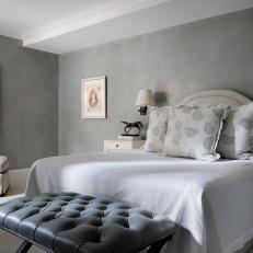 Gray Bedroom With Sponge-Style Wall Treatment & Tufted Bench