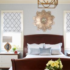 Contemporary Blue Guest Bedroom With Classic Accessories