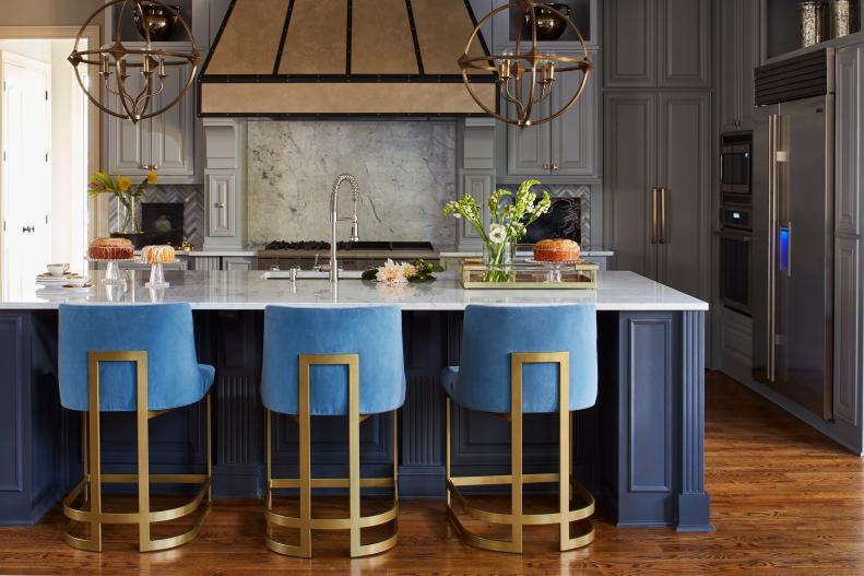 Modern Kitchen With Contemporary Metal Bar Stools And Pendants 