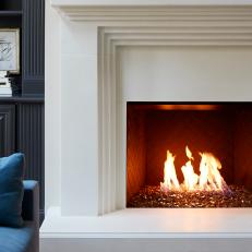 Modern White Gas Fireplace With Fire Glass And Modern Surround