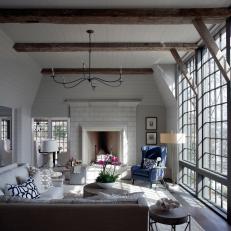 Neutral Great Room with Limestone Fireplace, Ceiling Beams