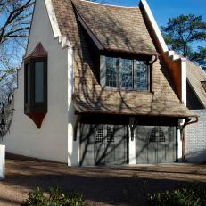 Garage-Turned-Carriage House with Gothic Doors