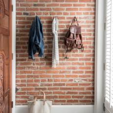 Foyer With Exposed Brick