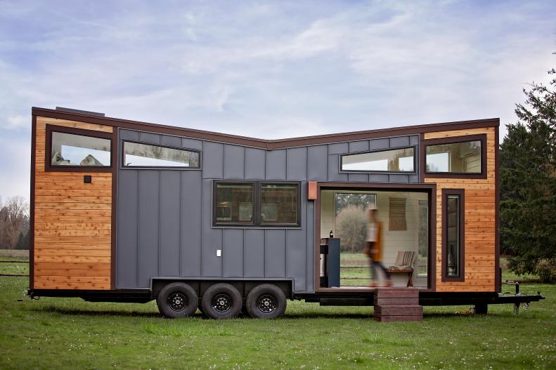 Tiny House With Metal And Wood Siding And Retractable Overhead Door