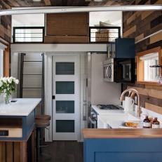 Modern Tiny House Open Concept Kitchen And Loft Bedroom With Retractable Overhead Door