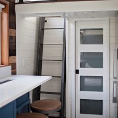 Tiny House Loft Iron Stairway Detail With White And Wood Accents