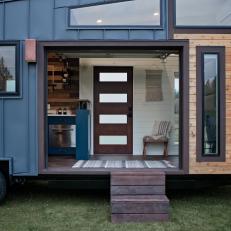 Modern Tiny House With Metal And Wood Siding And Retractable Door