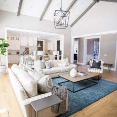 Modern Side Table Complements Caged Chandelier in Living Room