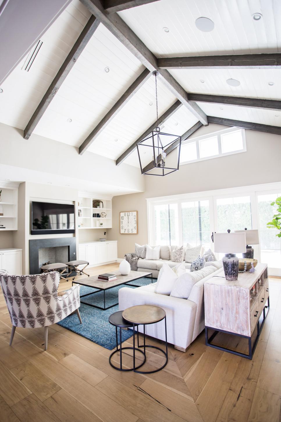 Transitional Living Room Boasts Vaulted Ceilings With Wood Beams | HGTV