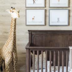 Neutral Nursery With Stuffed Giraffe