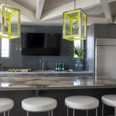 Gray Kitchen With Yellow Lantern Pendants